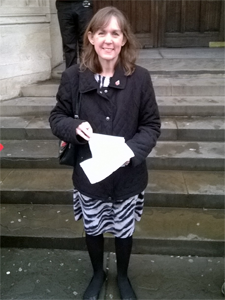 Female UCU member outside the University of Bristol Wills Memorial Building
